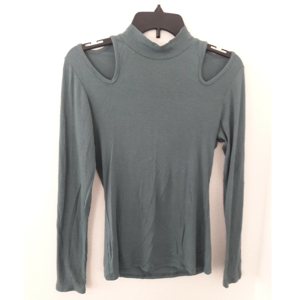 Women's Fashion cutout turtleneck.